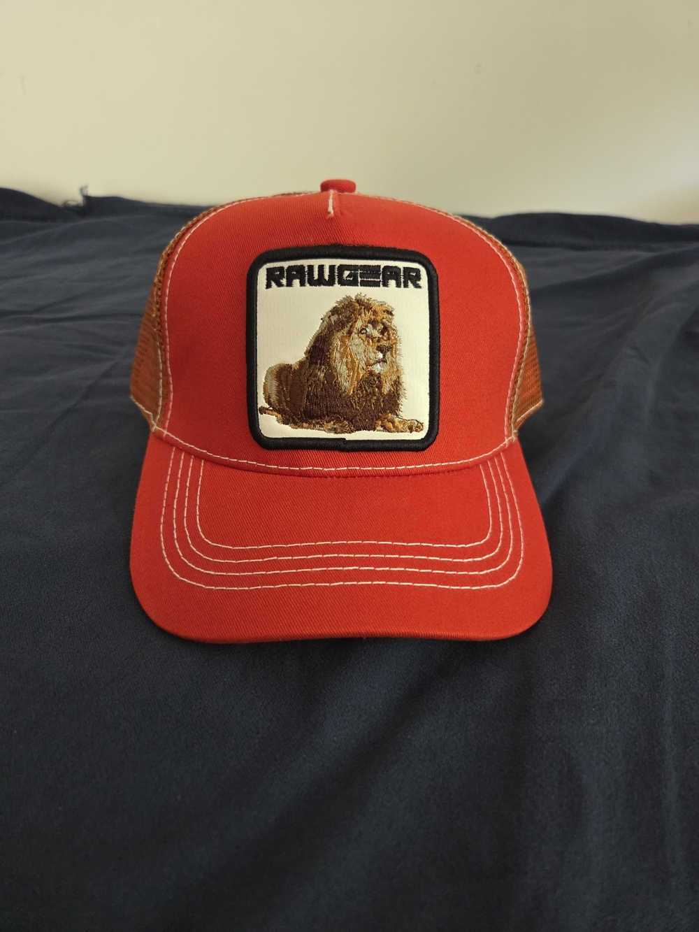 Rawgear Lion Patch Trucker Hat